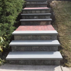 Concrete and brick stair paving installation for a durable walkway.