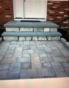 Stone stair design with surrounding walkways and landscaping.