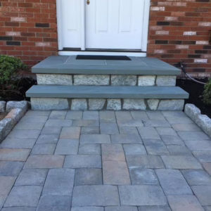 Stylish stone accents on stairs and walkways.