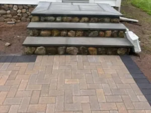 paver walkway and stone steps installation showing finished entry steps
